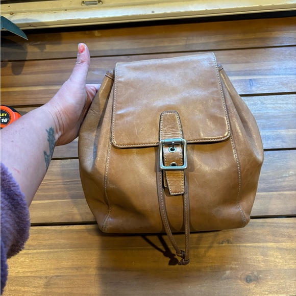 Coach Handbags - Coach Tan leather small backpack